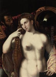A Woman With A Mirror by Tiziano Vecellio (Titian)