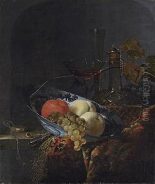 Grapes, Peaches And An Orange In
 A Porcelain Bowl, With A Watch,nuts, A Knife, A Glass Decanter, 
Wine-glasses, Grapes And A Carpeton A Wooden Table - view 1