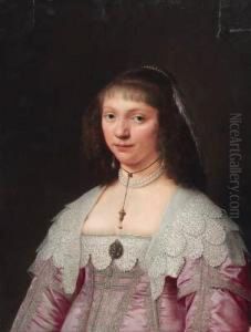 Portrait Of A Lady, Bust-length,
In A Crimson Silk Embroidereddress With Lace Trimmings And A Pearl
Necklace by Jacob Fransz van der Merck