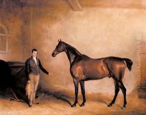 Mr C N Hoggs Claxton and a Groom in a Stable