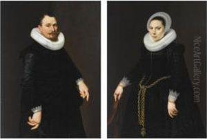 A Portrait Of Pieter Merchijs
(1582-before 1628), Aged 39, Standing Three-quarter Length, Wearing An
Elaborate Black Suit With White Lace Cuffs And A Mill-stone Collar,
Holding A Hat; A Portrait Of His Wife, Maria Florianus (born 1600), Aged
22, S by Cornelis van der Voort