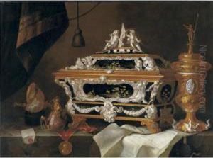 Still Life With An Elaborate
Silver And Black Lacquer Casket, A Gilt Cup And Cover, A Teapot, A
Letter, A Medallion, Nautilus Cup And A Watch All On A Ledge by Pieter Gerritsz. van Roestraten