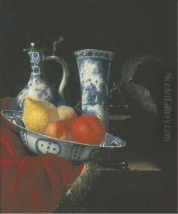 A Blue And White Wan-li Klapmuts
Bowl With Peaches, A Lemon And Anorange, A Silver-mounted Transitional
Ewer, A Beaker, A Glass Tazzaand A Knife On A Partly-draped Stone Ledge by Juriaen van Streeck