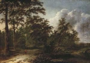 A Wooded Landscape With Huntsmen On A Path