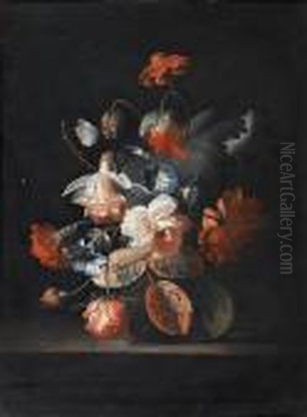 Poppies, Roses, Carnations And Other Flowers In A Glass Vase On A Stone Ledge - view 1