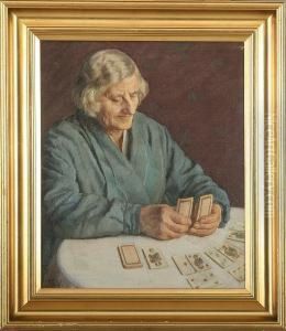 An Elderly Lady Playing Solitaire
