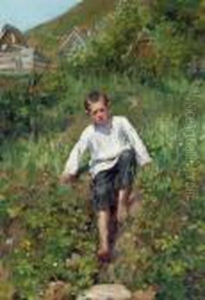 A Boy Climbing Down A Bank - view 1
