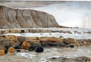 Coastal Landscape At Low Tide With Rocky Foreshore And Distant Boat