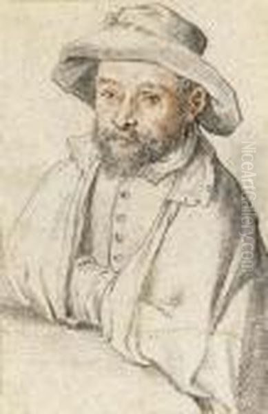 Portrait Of A Bearded Man Seated At A Table - view 1