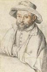 Portrait Of A Bearded Man Seated At A Table