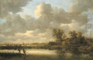 A river landscape with fishermen drawing in their nets near a village by Jan van Goyen