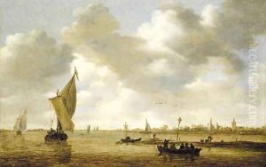 An estuary with passengers in a ferry, a kaag and other shipping by a mudflat, a village beyond by Jan van Goyen