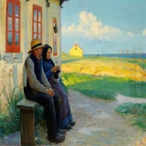 Two Elderly People In Front Of Their House On A Summer Evening