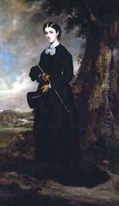 Young woman wearing a black riding habit and standing in a landscape