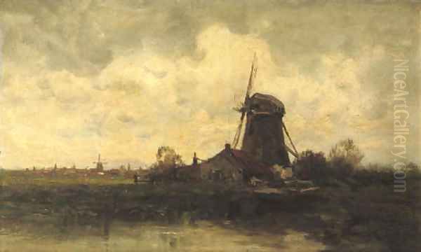 A windmill along a river - view 1