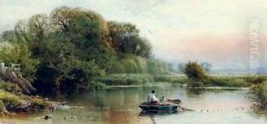 A river landscape at dusk with young anglers dragging in their nets by William W. Gosling