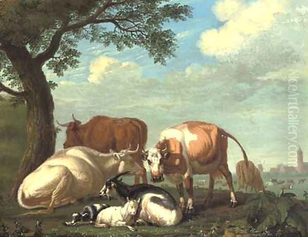Cows and goats resting by a tree, a village beyond - view 1