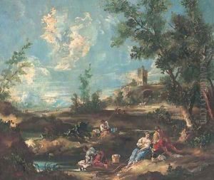 A landscape with anglers by a river, a town beyond by Francesco Guardi