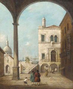 A Venetian courtyard with figures under a colonnade by Francesco Guardi