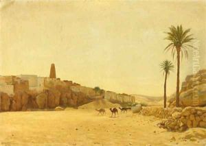 Camels before a North-African dessert village