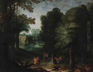 A wooded Landscape with Peasants feasting in a Clearing by Abraham Govaerts