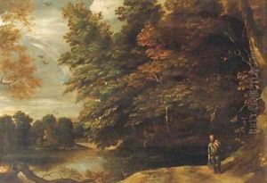 A river landscape with a fisherman on a path at the edge of a wood