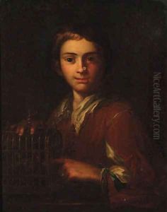 A youth pointing at a birdcage