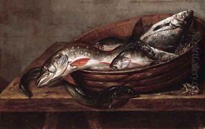 Dead fish in a bowl on a table with a dead frog Dead fish in a bowl on a table with a dead frog