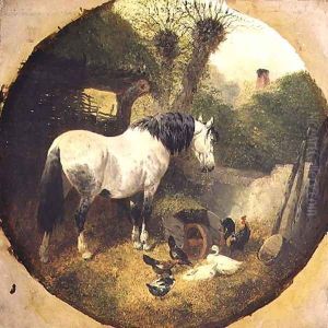 A Carthorse eating hay from a wheel-barrow in a farmyard