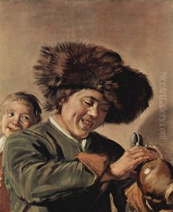 Two smiling young men, with a beer mug