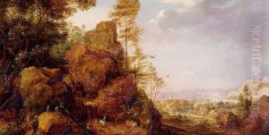 A Mountainous Lanscape With A Rocky Outcrop By The Edge Of A Wood, Goats And A Reindeer Resting By A Waterfall, A Village In An Extensive Landscape Beyond by Gillis Claesz. De Hondecoeter