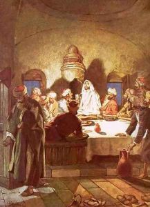 Jesus breaking bread and giving his disciples the cup