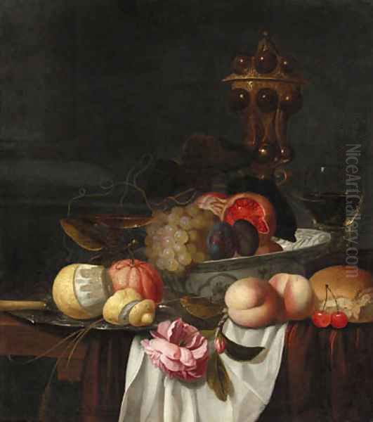 Grapes, pomegranates and plums in a Wanli 'kraak' porselein bowl, an orange and a partly peeled lemon on a pewter plate, peaches, cherries, bread - view 1