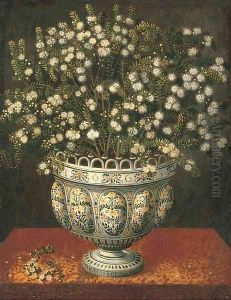 Myrtle in a lobed-footed polychrome maiolica Manises vase on a draped ledge
