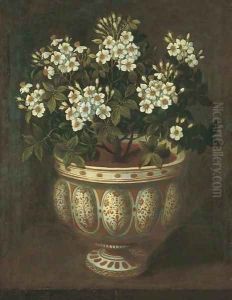 White roses in a lobed-footed copper-lustre maiolica Manises vase on a ledge