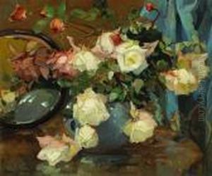 Roses In A Blue Vase On A Table With Amirror