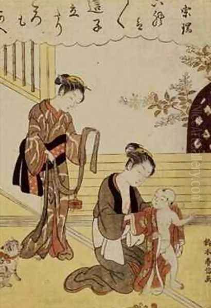 A mother dressing her young son in a kimono - view 1