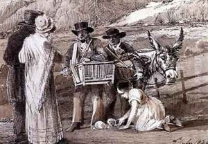 Two men selling guinea pigs one with an organ grinder by John Harden