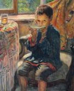 A Young Boy Drinking Tea