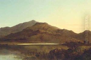 Fishermen by a lake at dusk