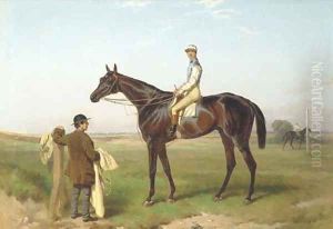 Fisherman with jockey up attended by a groom on a race course