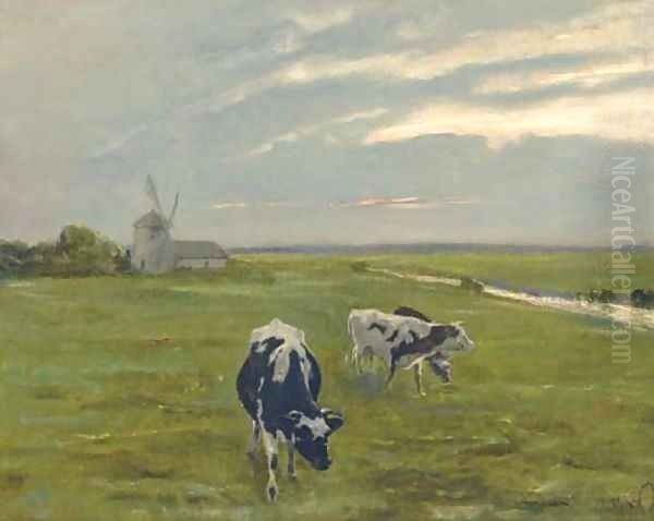 Cattle before a windmill at dusk - view 1