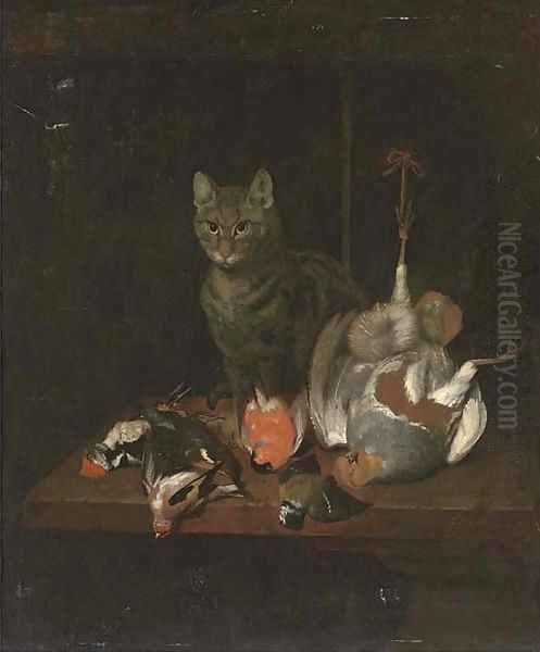 A cat seated on a wooden table with dead birds - view 1