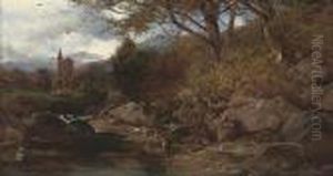 An Angler Resting On A Rocky River Bank
