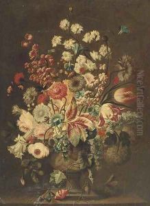 Parrot tulips, roses, hydrangeas, carnations and other flowers in a sculpted urn on a ledge by Jan Van Huysum