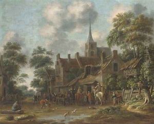 A town with horseman and other figures drinking outside an inn