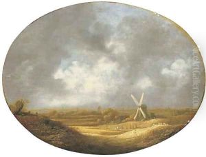 An extensive landscape with peasants harvesting wheat by a windmill, an estuary beyond by School Of Haarlem