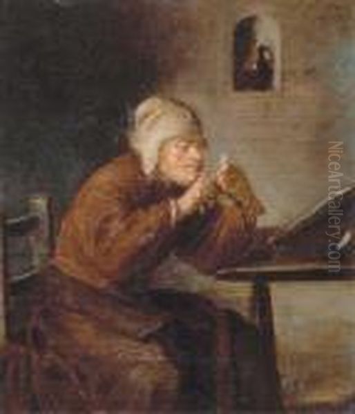 A Man Seated At His Desk Sharpening His Pen - view 1