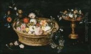 Roses, Peonies, Tulips,
Narcissi, Carnations, Poppies And Other Flowers In A Basket And A Gilt
Tazza, On A Table by Jan Brueghel the Younger
