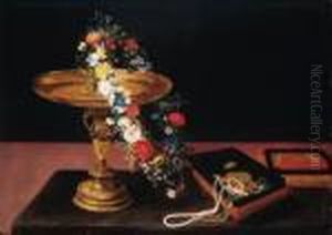 A Garland Of Mixed Flowers Around A Silver Gilt Tazza And A Casketon A Table by Jan Brueghel the Younger